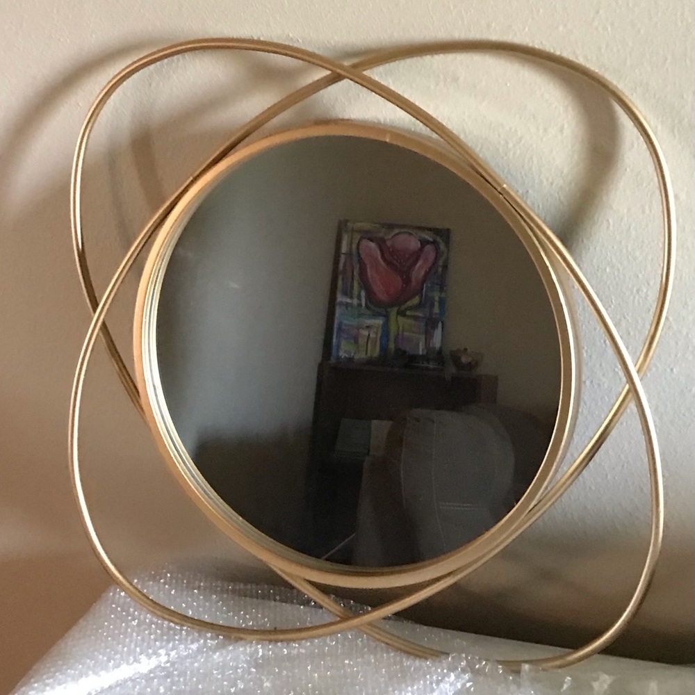 Gold mirror. I have two.interested in pair send me message to work good deal